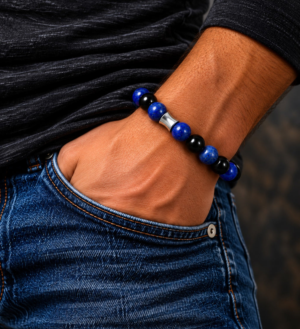Men's handmade 10mm Lapis Lazuli and Black Obsidian bracelet modeled on a man's wrist