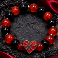 Style 3 red and black spiderweb heart Halloween bracelet on dark seasonal background