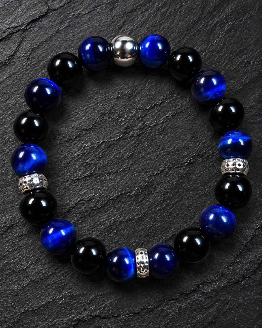 Men's 10mm Black Onyx and Lapis Lazuli Colored Tiger Eye bracelet on charcoal slate